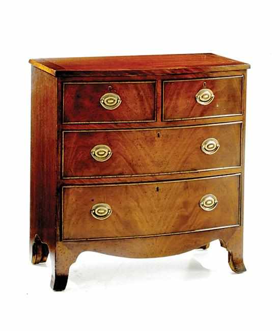 Appraisal: Georgian style diminutive bowfront chest of drawers th century D-shaped