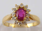 Appraisal: A yellow metal tests carat gold ruby and diamond ring