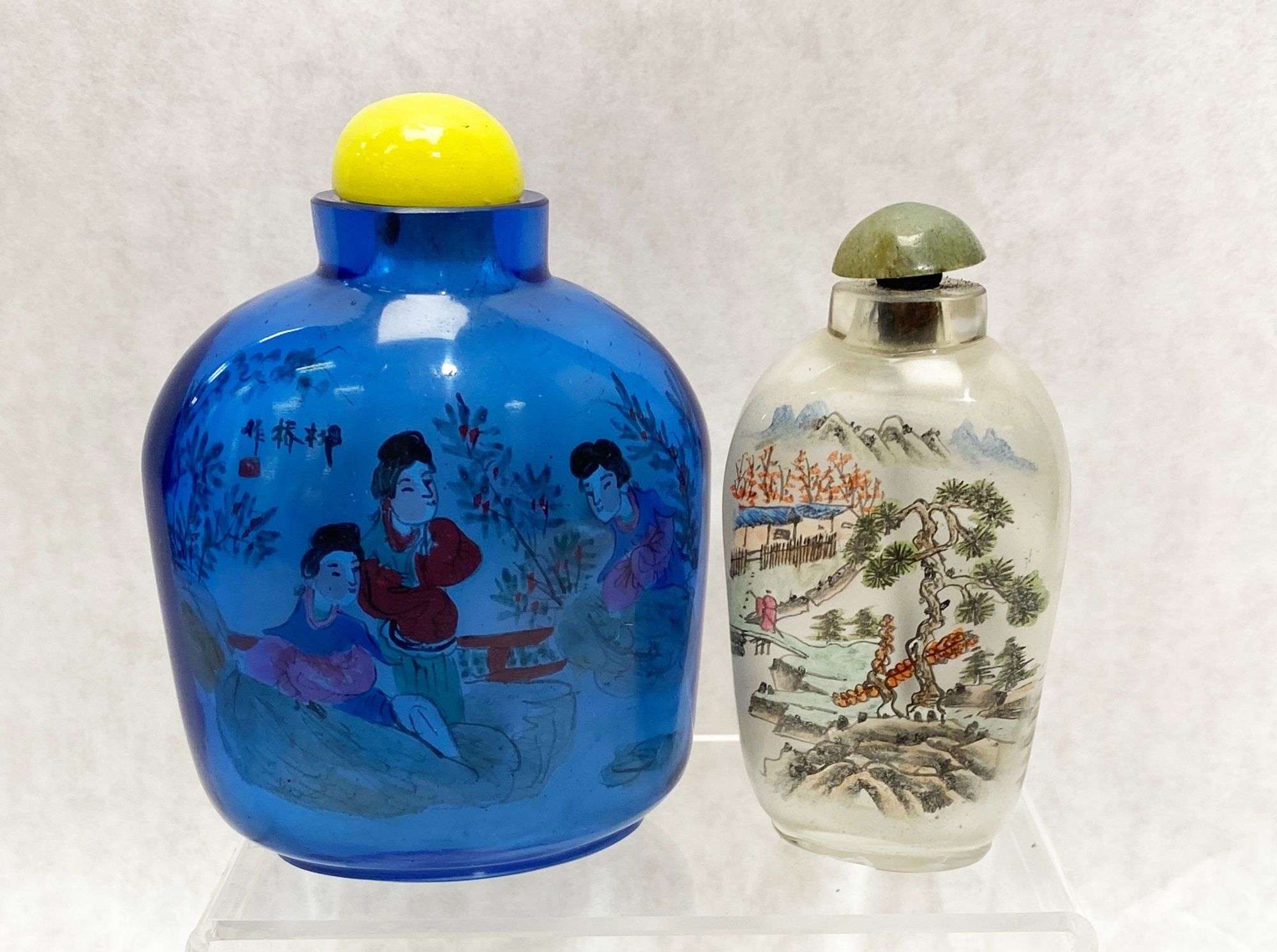 Appraisal: Chinese Reverse Painted Snuff BottlesCondition smaller one has small chips