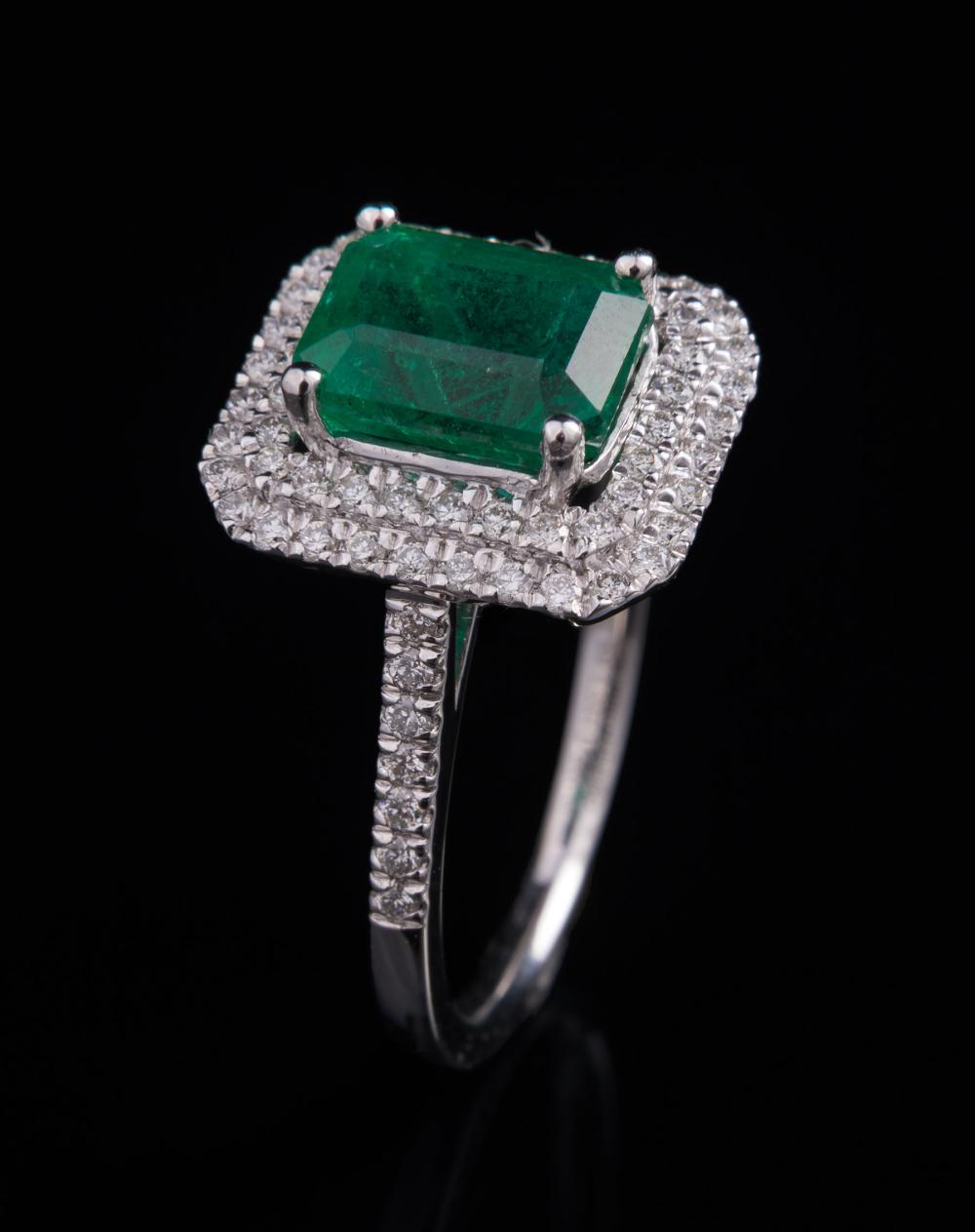 Appraisal: Platinum Emerald and Diamond Ring center prong set octagonal step