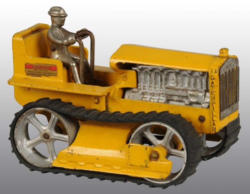 Appraisal: Cast Iron Arcade Caterpillar Tractor Toy Description Rubber tire variation