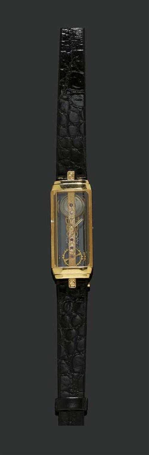 Appraisal: LADY'S WRISTWATCH CORUM GOLDEN BRIDGE s Yellow gold Rectangular facetted