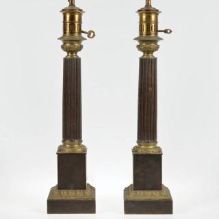 Appraisal: Pair Restauration bronze columnar carcel lamps th c converted to