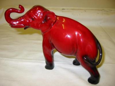 Appraisal: A ROYAL DOULTON FLAMBE ELEPHANT designed by Noke modelled standing