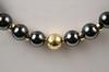 Appraisal: NECKLACE - K yellow gold and hematite bead necklace thirty-eight