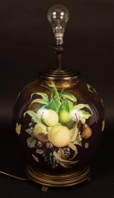 Appraisal: A porcelain vase painted fruit cm high now a lamp