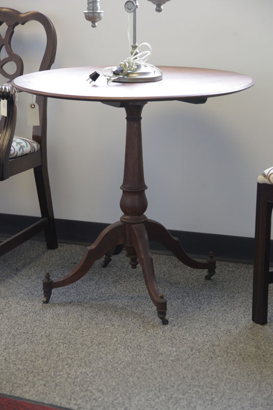 Appraisal: TILT TOP TEA TABLE Walnut Having a turned post and