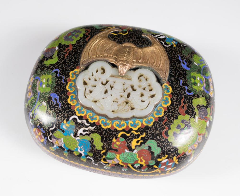 Appraisal: CHINESE OVAL CLOISONNE BOX with colorful playing foo-lions on a