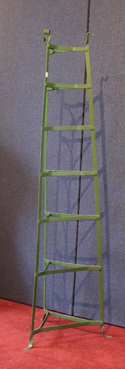 Appraisal: A wrought iron pot stand green painted with seven tiers