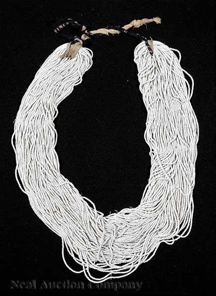 Appraisal: A Collection of African Trade Beads numerous strands of white