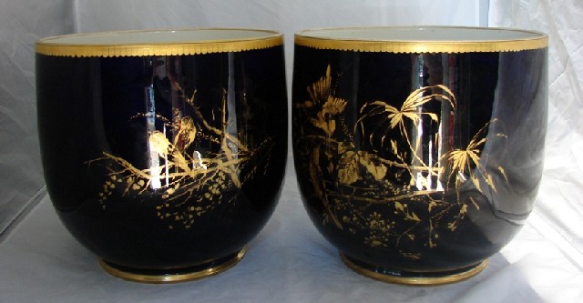 Appraisal: A pair of th century cobalt blue ground porcelain planters