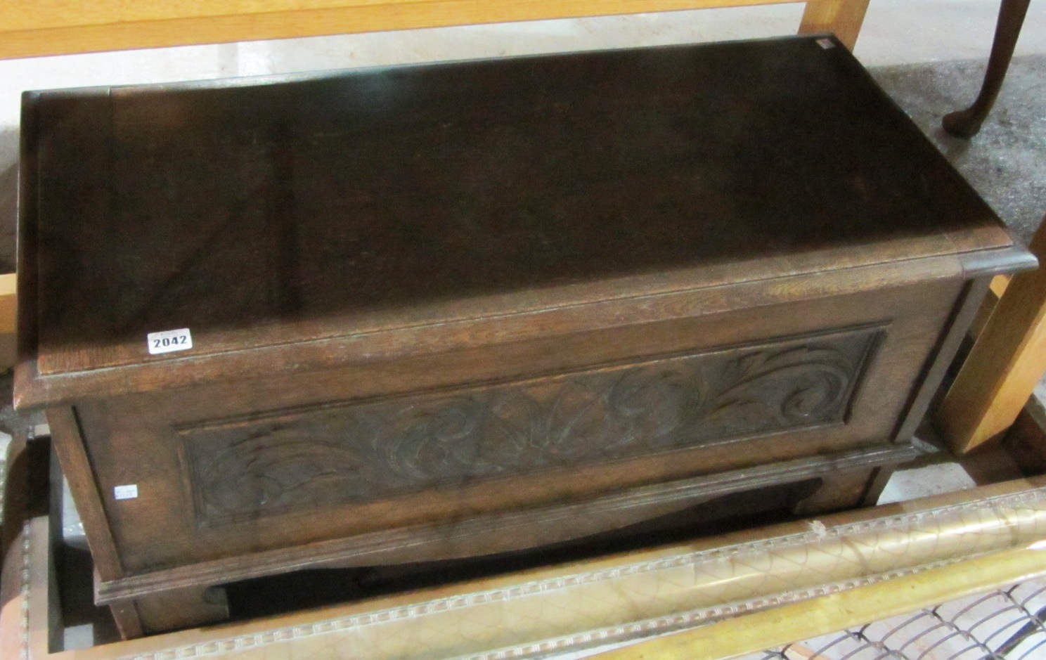 Appraisal: A th century small oak blanket chest with carved decoration