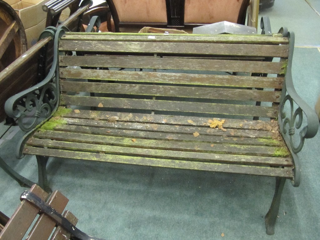 Appraisal: Three cast iron garden benches and two chairs