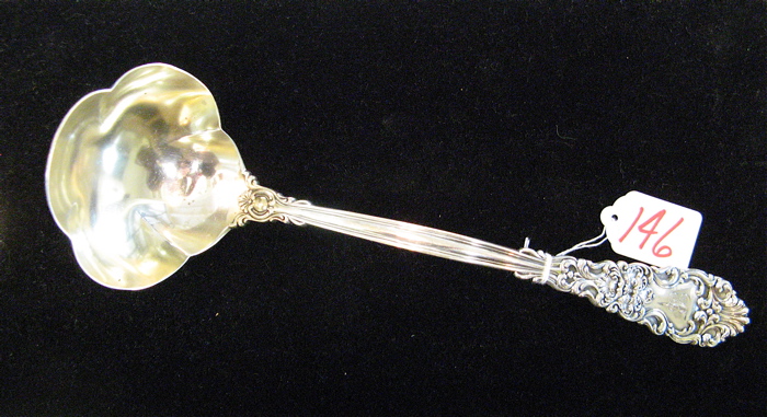 Appraisal: TH C AMERICAN STERLING SILVER PUNCH LADLE an ornate pattern