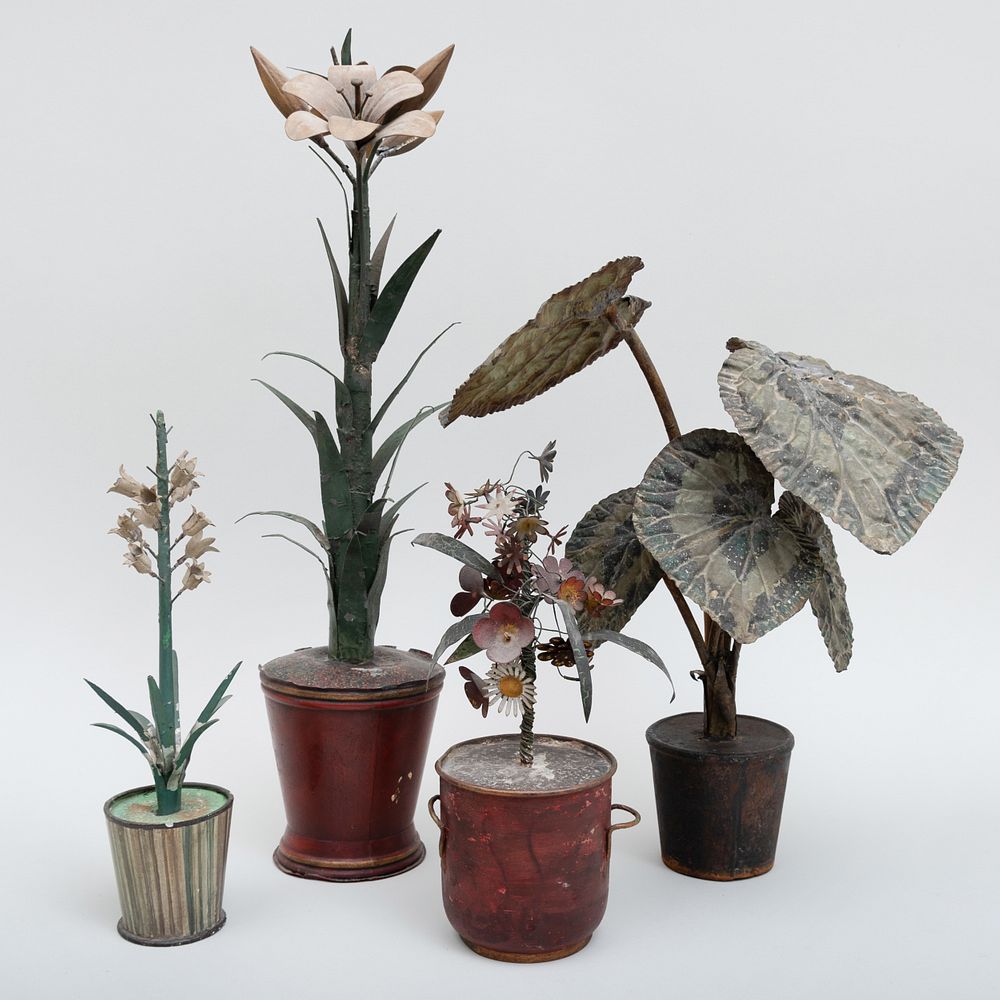 Appraisal: Group of Four Polychrome Painted Tole Models of Potted Plants