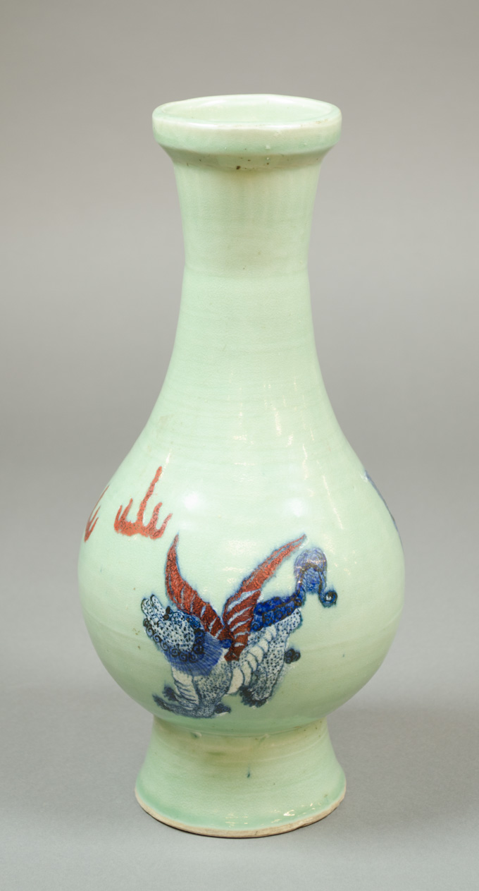 Appraisal: CHINESE CELADON GLAZED PORCELAIN VASE having a solid green glaze