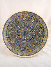 Appraisal: An Ottoman pottery charger the central calligraphy reading Ya Allah