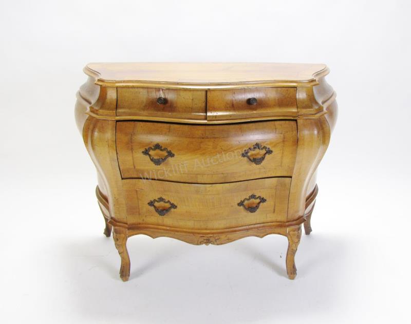 Appraisal: An Italian Bombe style walnut commode full and half drawers