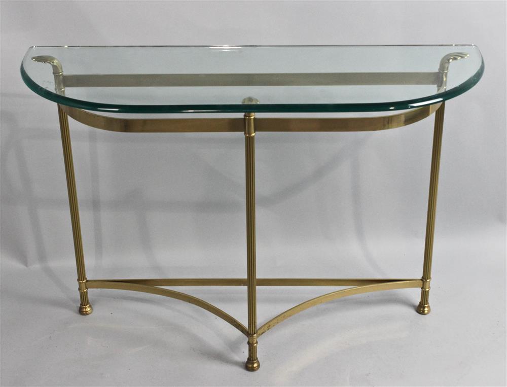 Appraisal: MAISON JANSEN STYLE GLASS AND BRASS CONSOLE TABLE in demilune