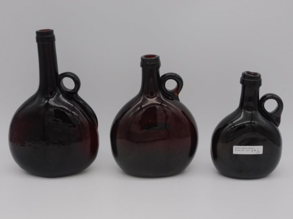 Appraisal: HANDLED CHESTNUT STYLE WHISKY BOTTLES THc To include one at