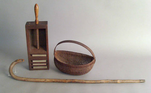 Appraisal: Cane with an eagle grip together with a hanging wall