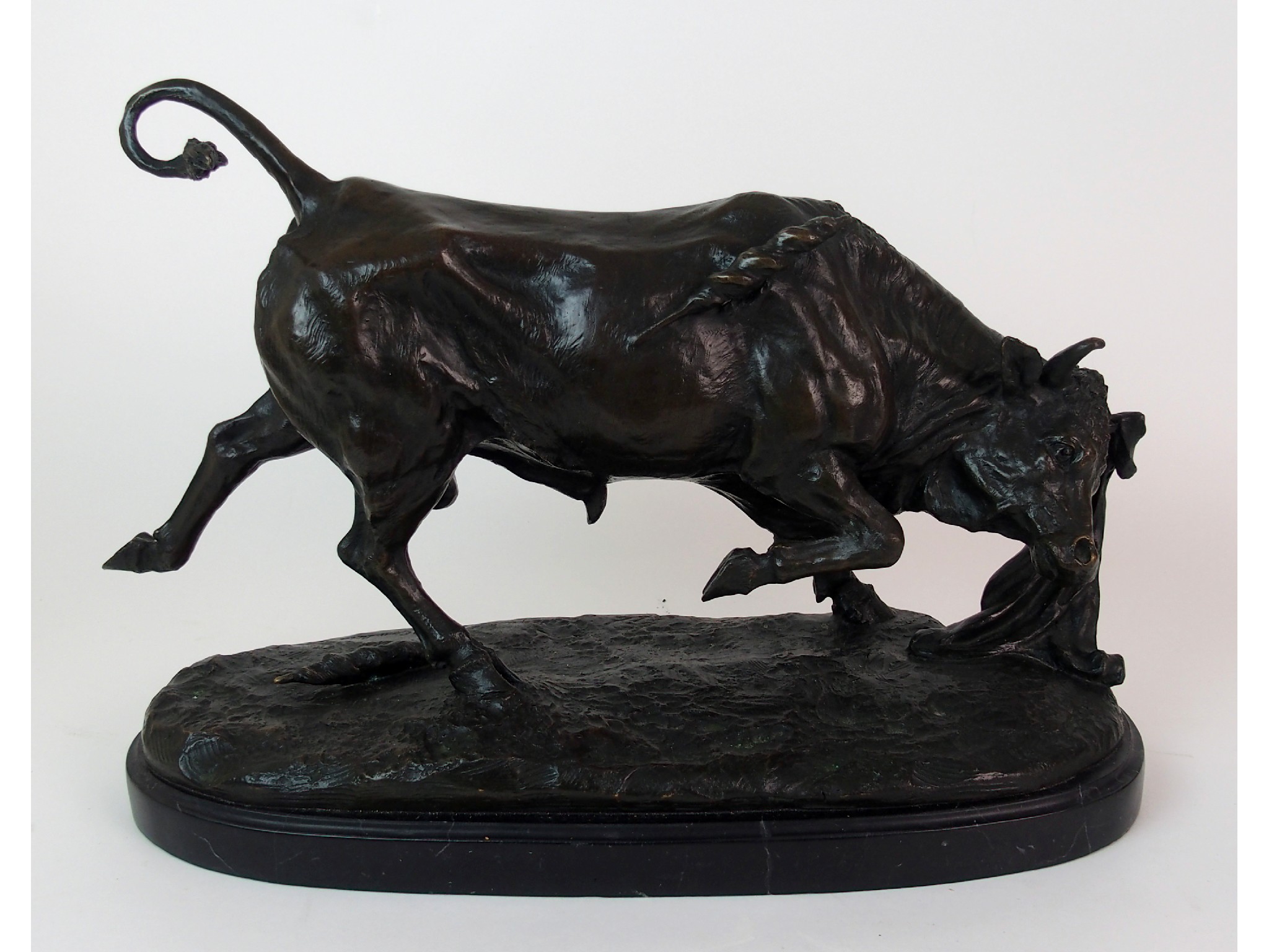 Appraisal: A French patinated bronze statue of a bull after Paul