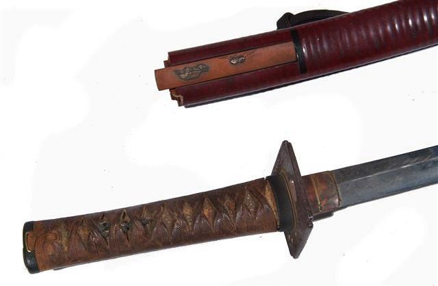 Appraisal: A JAPANESE WAKISHI with signed kodzuka in a lacquered scabbard