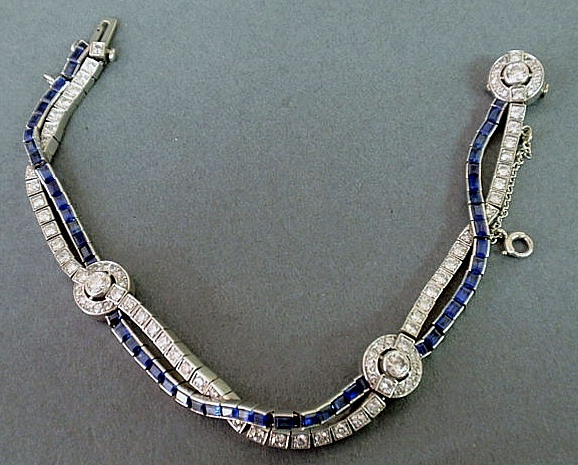 Appraisal: Platinum diamond and sapphire channel set bracelet with a circle