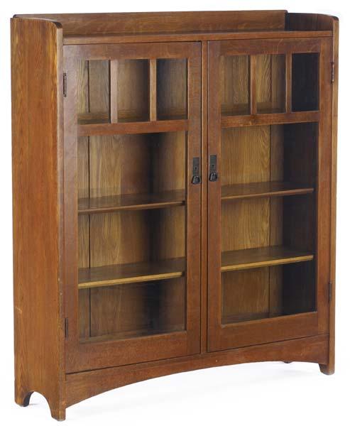 Appraisal: L AND J G STICKLEY Double-door bookcase with three shelves