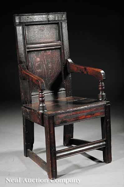 Appraisal: A Jacobean Joined Oak Armchair th c paneled rectangular back