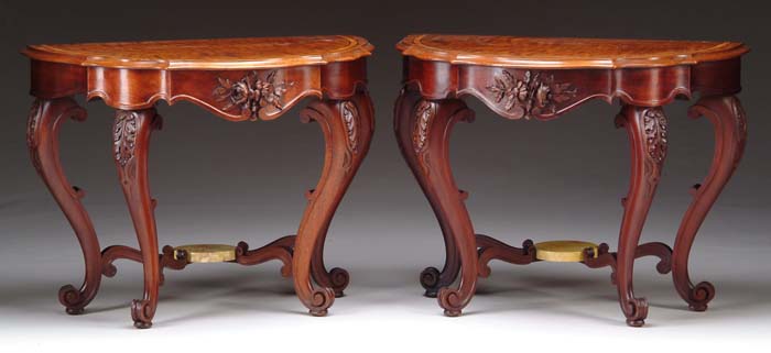 Appraisal: PAIR OF VICTORIAN WALNUT DEMILUNE TABLES Tables having molded and