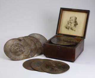 Appraisal: Early th c German disc player with discs Late th