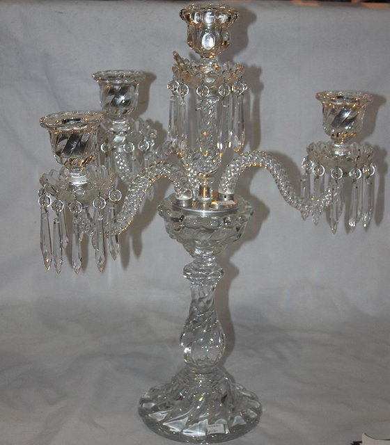 Appraisal: A GLASS WRYTHEN CANDELABRA with four branches each with lozenge