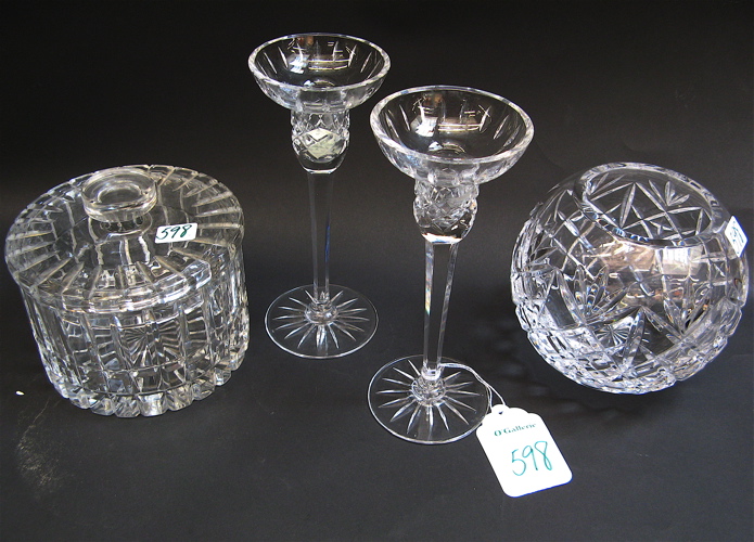 Appraisal: FOUR CLEAR CUT CRYSTAL ACCESSORIES including a pair of candleholders