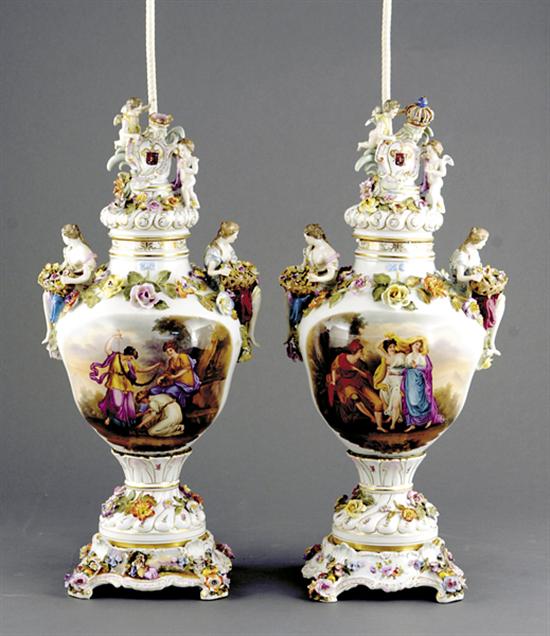 Appraisal: Pair Meissen style porcelain covered urns th centuryRococo-style domed cover