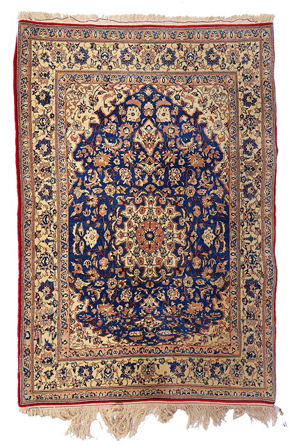 Appraisal: A PERSIAN BLUE GROUND RUG with a central complex foliate