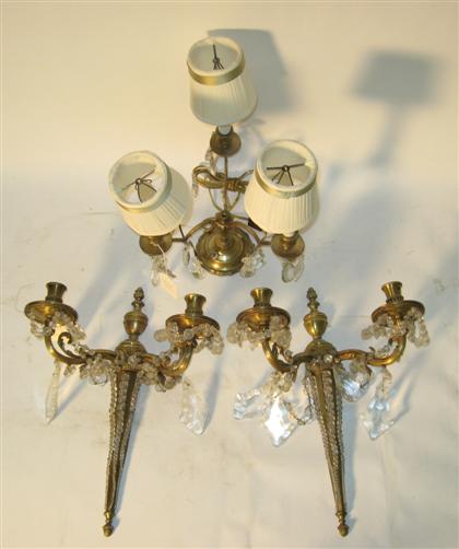 Appraisal: Pair of French gilt bronze two-light sconcesStyled with extending lights