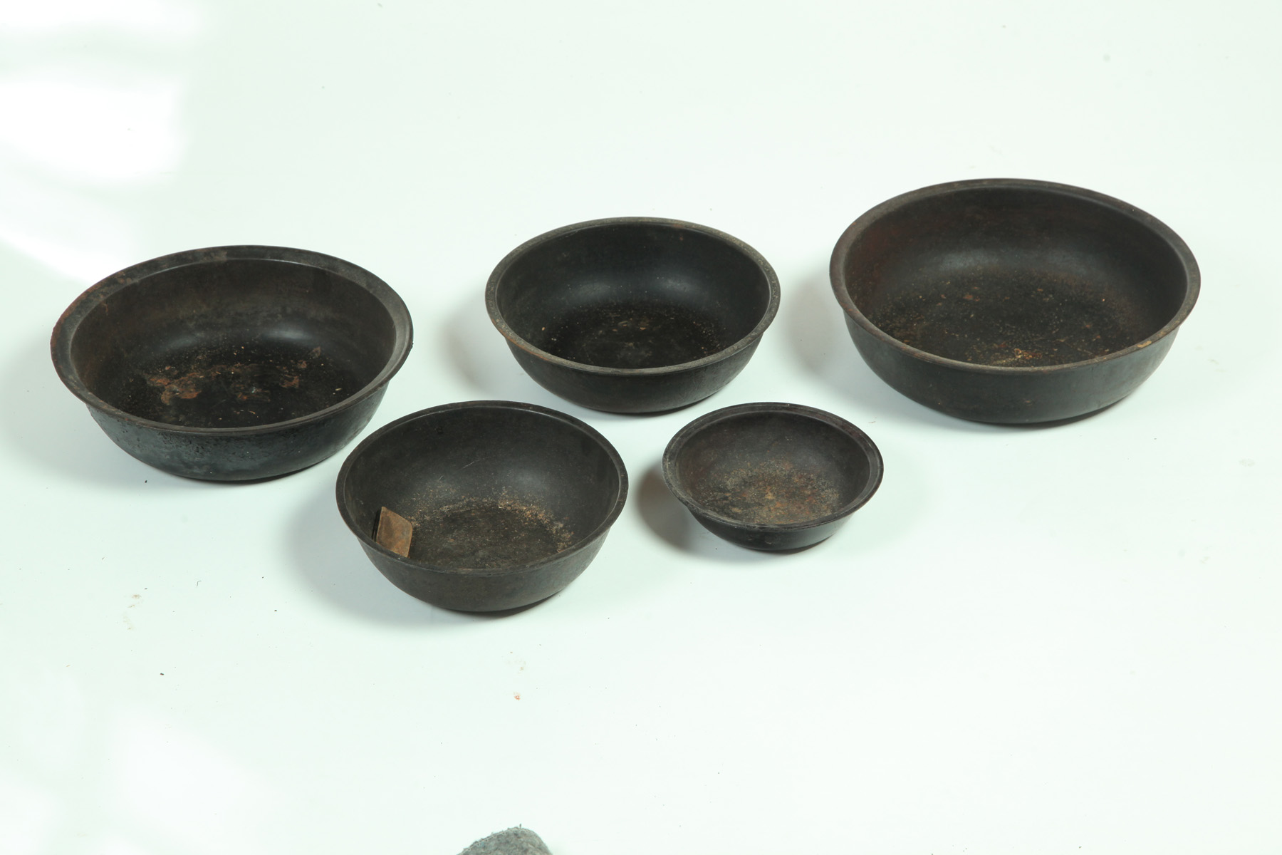 Appraisal: FIVE CAST IRON BOWLS American nd half- th century h