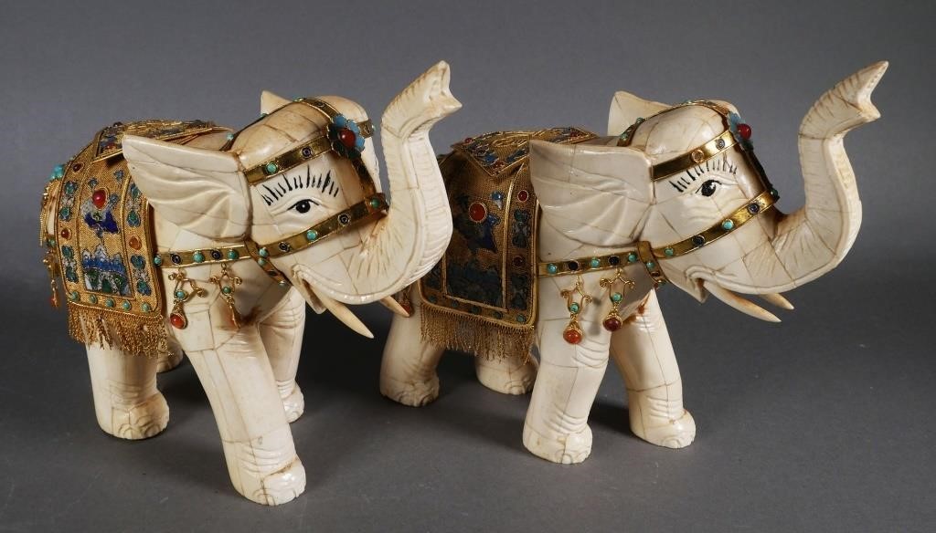 Appraisal: PAIR JEWELED THAI BONE ELEPHANTSTwo ornate gilt and jeweled tessellated