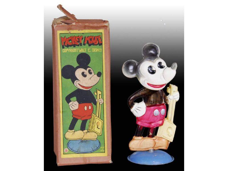 Appraisal: Walt Disney Celluloid Mickey Mouse Nodder Toy with Description ''