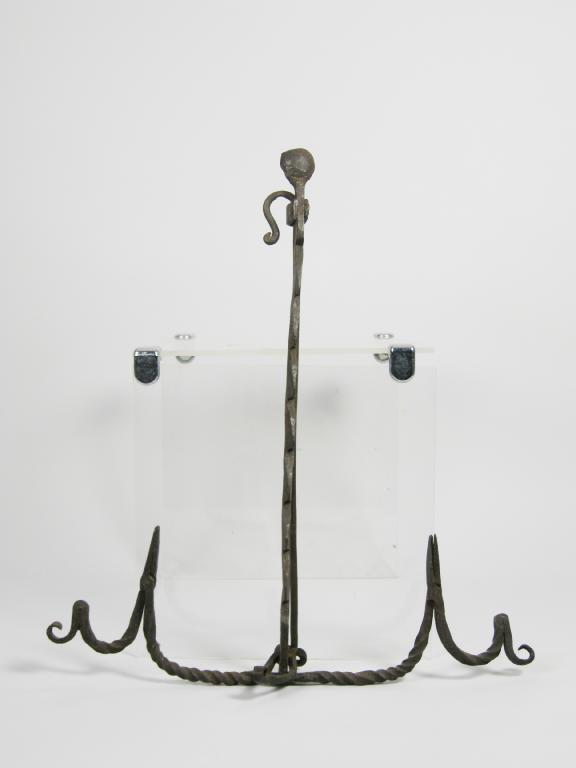 Appraisal: An early iron double hanging adjustable Rushlight in