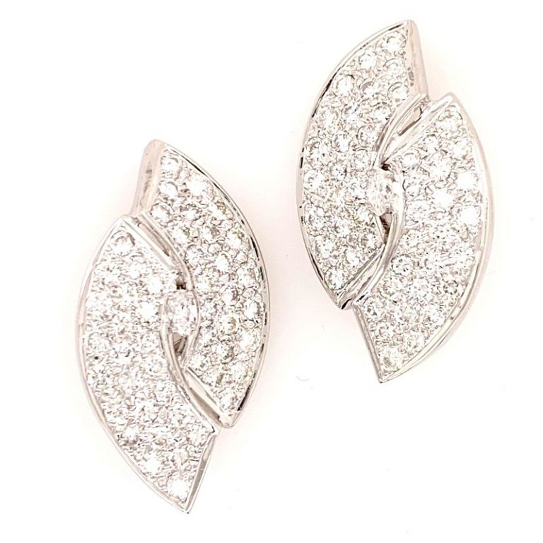 Appraisal: Diamond Offset Oval White Gold Clip Earrings Diamond Offset Oval