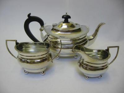 Appraisal: A BACHELOR'S THREE PIECE TEA SERVICE maker Mappin Webb Birmingham