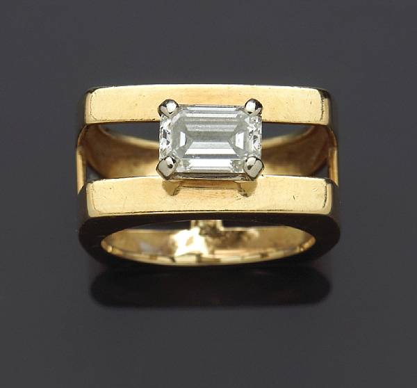 Appraisal: A diamond solitaire ring featuring a rectangular-cut diamond signed Le