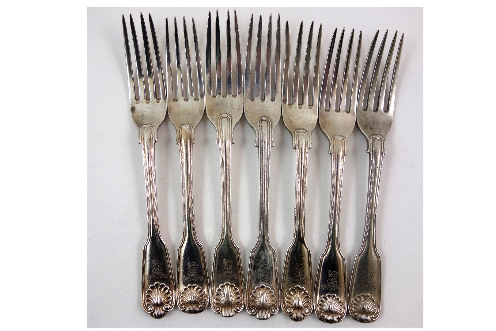 Appraisal: Seven Victorian silver fiddle thread and shell pattern dessert forks