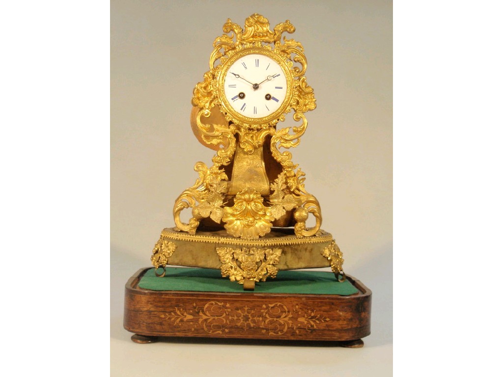 Appraisal: A thC French gilt metal mantel clock with eight day