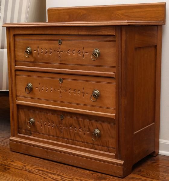 Appraisal: A TH C AMERICAN EASTLAKE STYLE CHESTThe three drawer cabinet