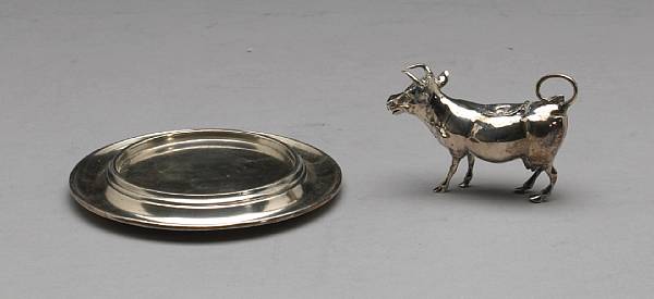 Appraisal: A continental silver cow creamerWith English import marks for Berhold