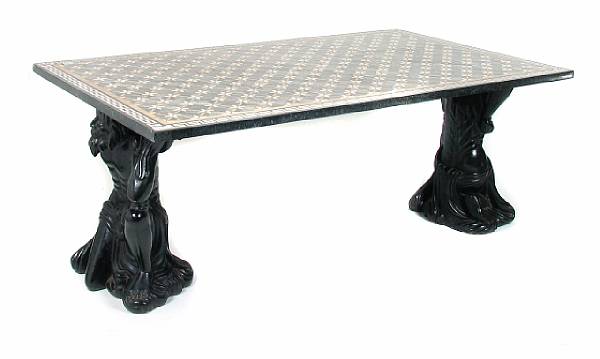 Appraisal: A marble veneered inlaid table with figural blackamoor base height