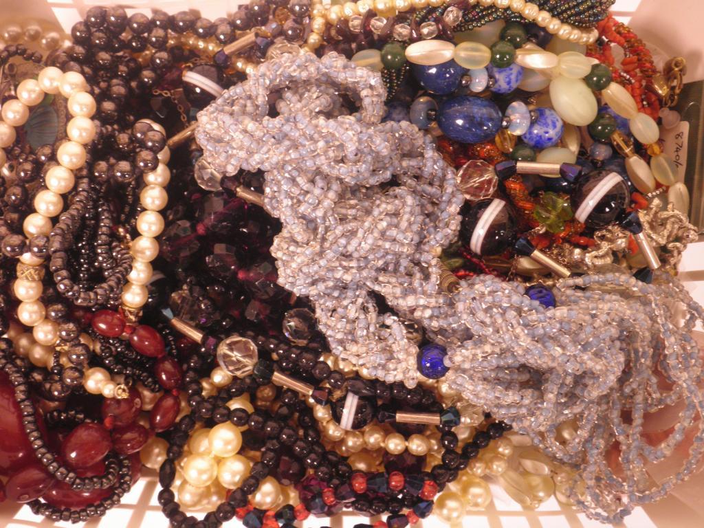 Appraisal: A large quantity of glass beads and costume jewellery etc